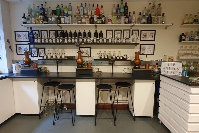 Distill a bottle of Gin on mini copper stills - A cocktail while your gin is distilling
