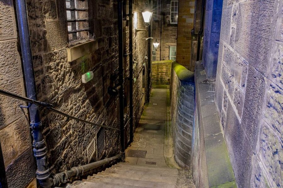 Edinburgh: Dark Secrets of the Old Town Ghost Walking Tour - Price, languages, and booking flexibility